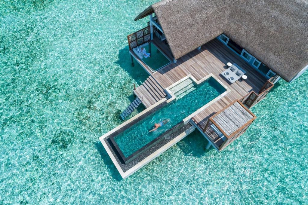Four Seasons Maldives pay with tabby or tamara