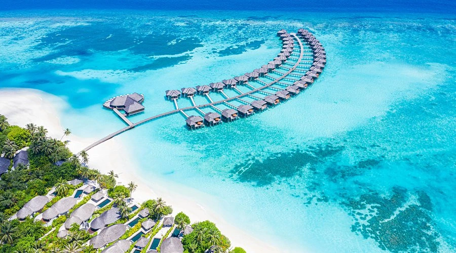 The Unique Worlds of Sun Siyam Resorts pay with tabby