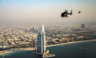 dubai helicopter tour pay with tamara and tabby