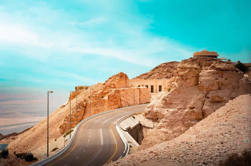 Jebel Hafeet Al Ain location — mountain road winding to the summit