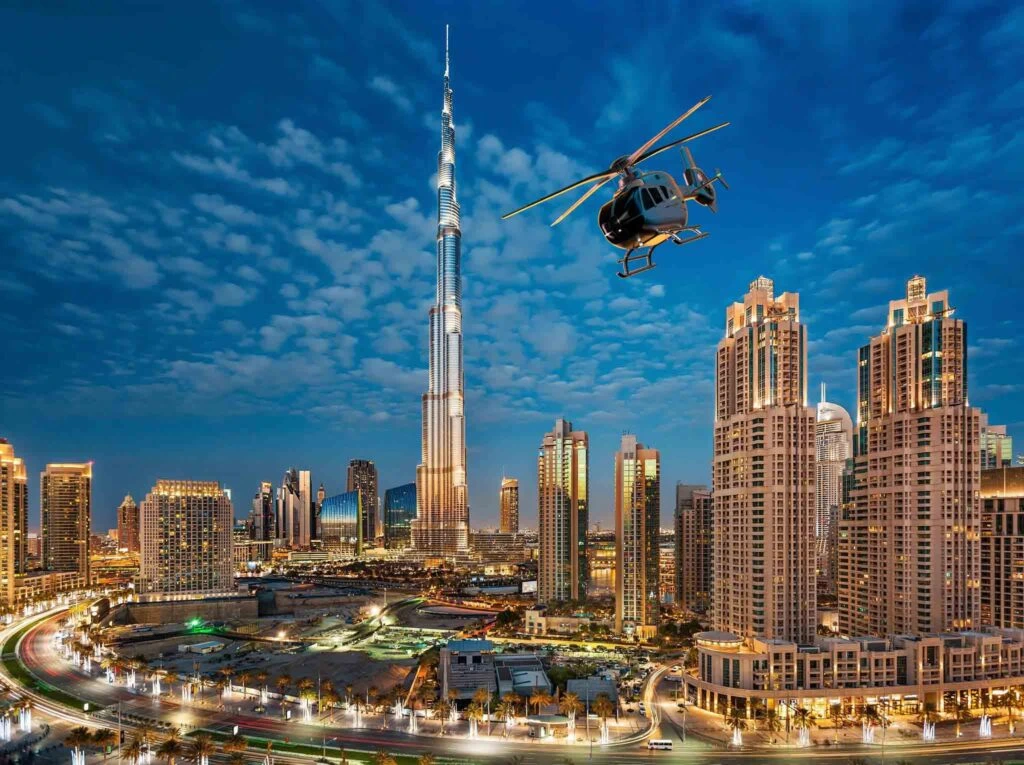 HeliDubai Helicopter Tour: Routes, Prices and Booking 2 Helicopter flying past Burj Khalifa and Downtown Dubai on a HeliDubai tour