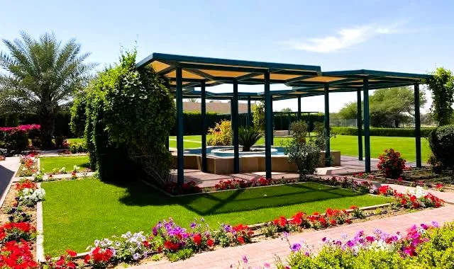 Islamic Botanical Garden in Sharjah: Plants of the Quran, Timings and Visit Guide 2 Shaded pergolas, lawns and flower beds at the Islamic Botanical Garden in Sharjah