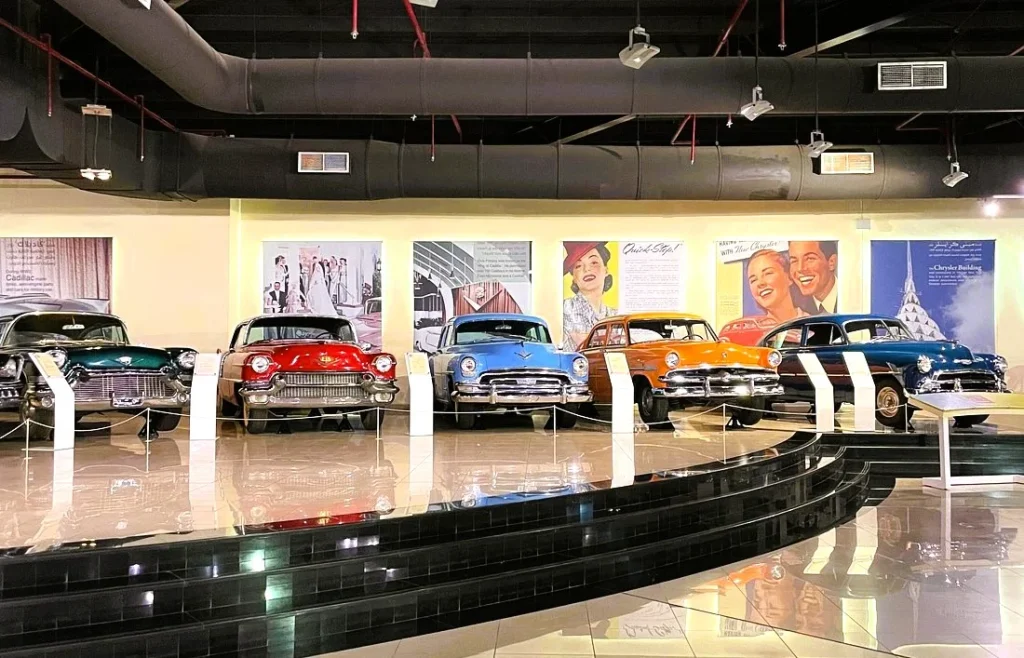 Sharjah Classic Cars Museum: Tickets, Timings and What to See 4 A row of vintage cars lined up in the main hall of the Sharjah Classic Cars Museum