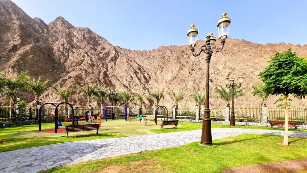 Shees Park in Sharjah: Waterfall, Timings, Things to Do and Nearby Hotels 4 Shees Park play area and lawn in Wadi Shees near Khorfakkan, Sharjah